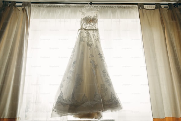 Unveiling the Magic: What Methods Are Used to Create a Wedding Dress with an Embellished Tulle Skirt?