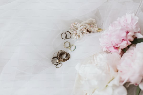 Mastering the Art of Wedding Dress Production: Elegant Trains and Intricate Embroidery