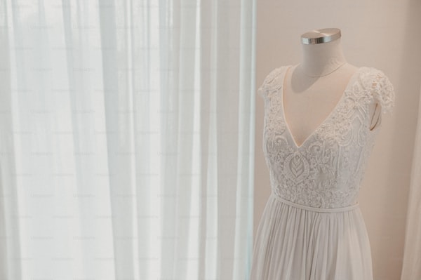 Exploring the Elegance of Lace Button-Back Wedding Dresses